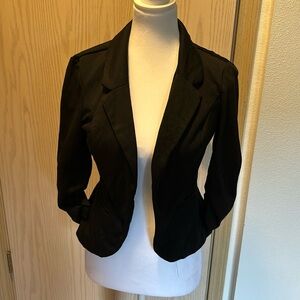 Black dress up jacket. Size medium.